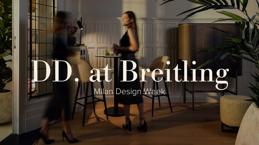 Photo of people in a room with DD at Breitling logo