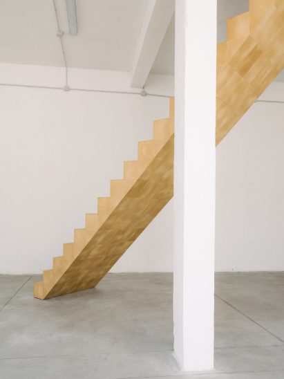 Large staircase with linoleum tiles