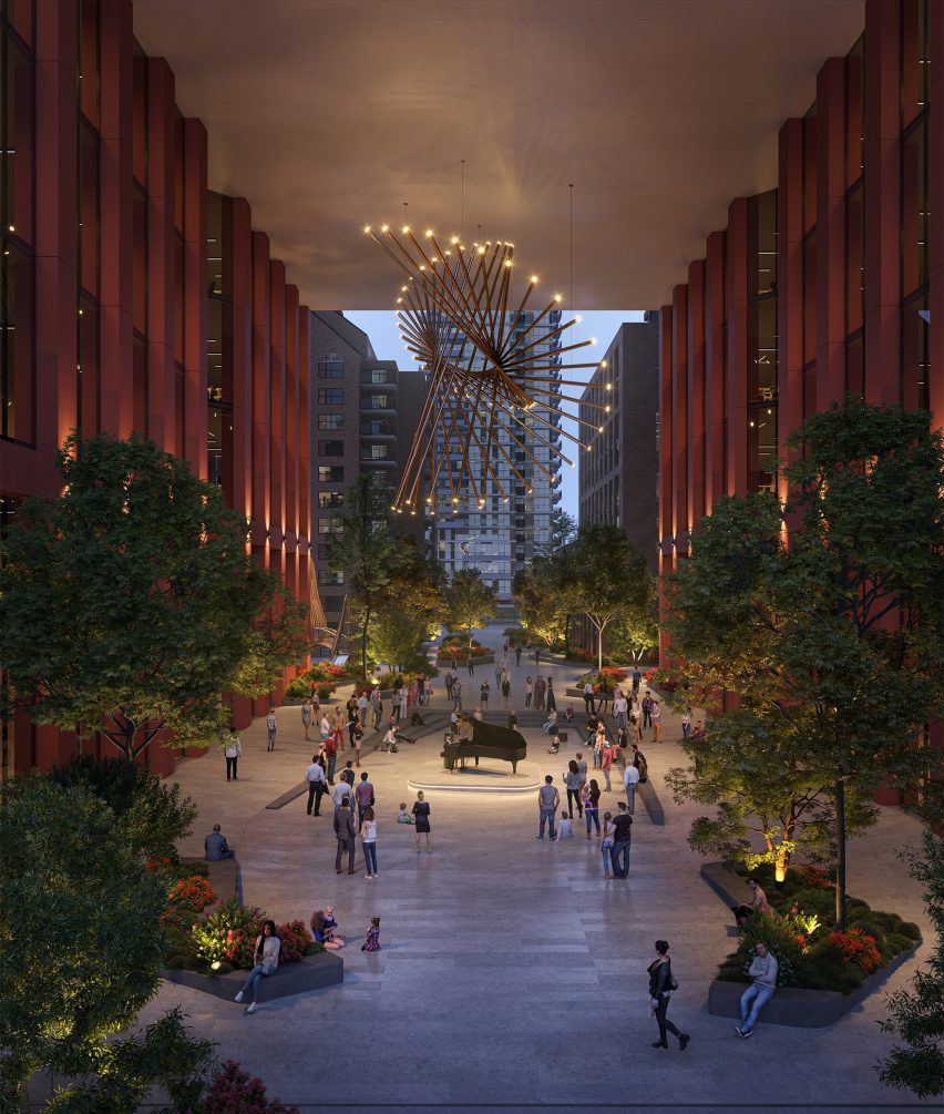 People walking in plaza under building