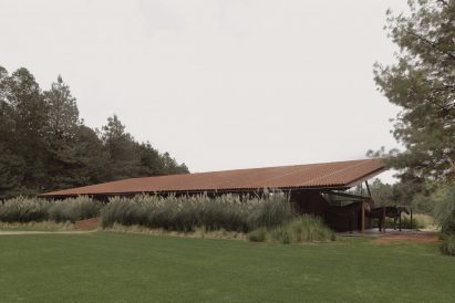 Stable building topped with clay tiles