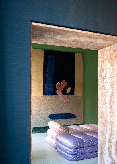 Pink and purple daybeds in a room