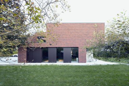 Exterior view of family home by OFIS Arhitekti