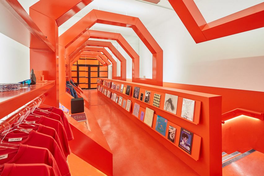 Wooden orange tunnel inside London fashion store