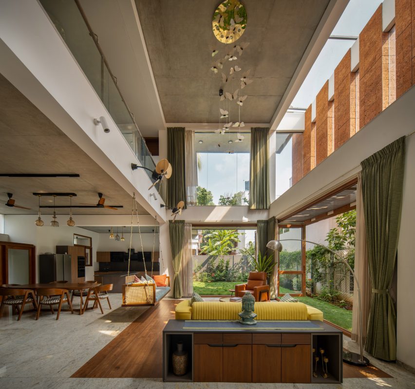 Double-height living room in a home in Bangalore