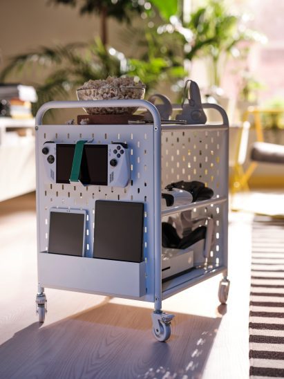 Caddy holding gaming equipment