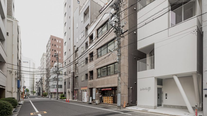 Hotel Rakuragu by Kooo Architects with cut-out details