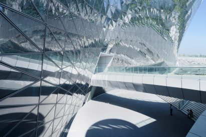 Close up of east facade at museum by MUDA Architects