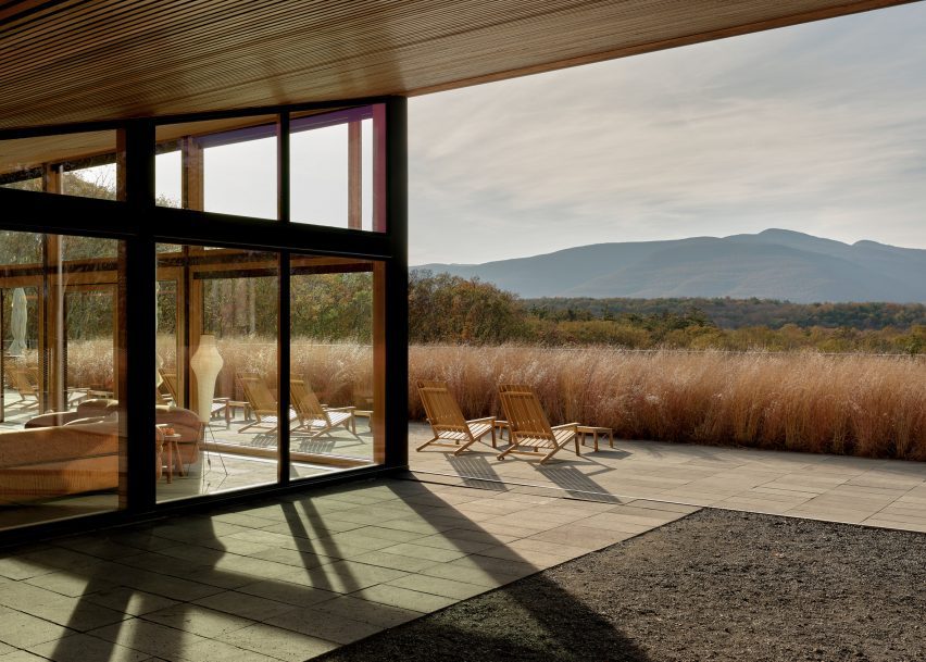 Wooden by porch with outdoor furniture