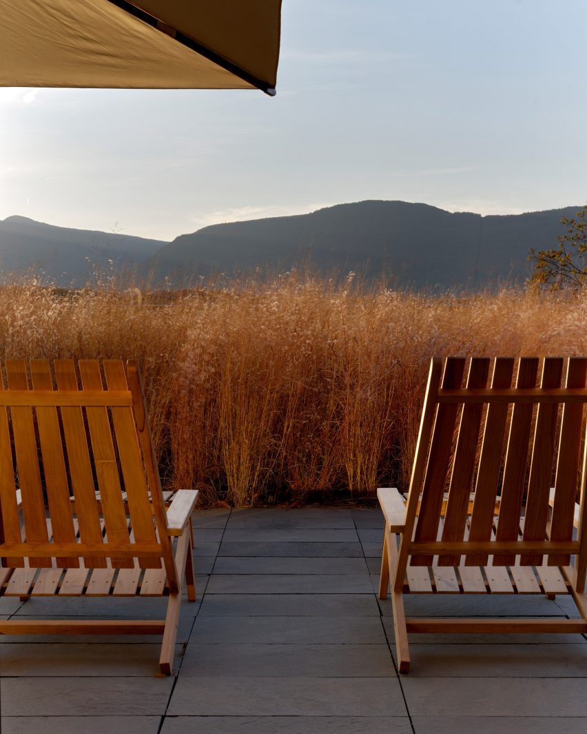 Lounge chairs looking out over mountains