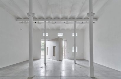 White art gallery with a rotating wall