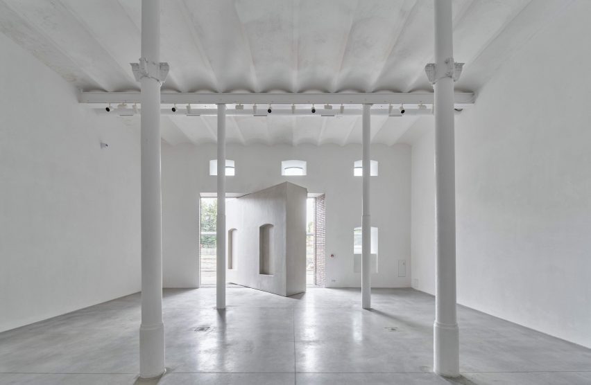 White art gallery with a rotating wall