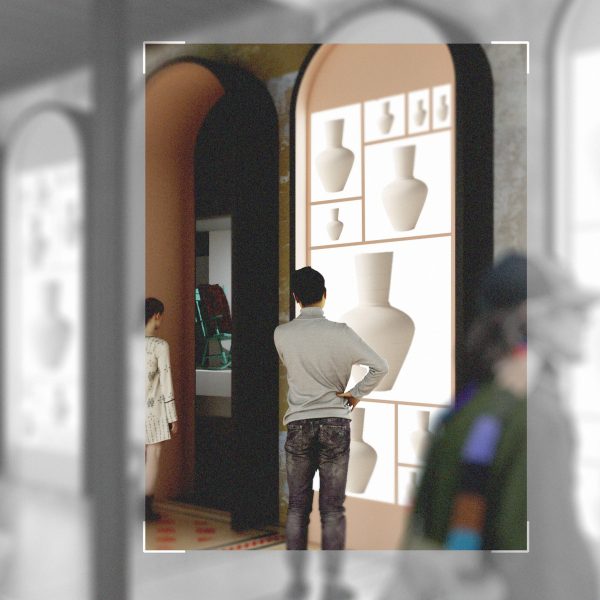 Interior design visual of a man looking at images of vases on a wall