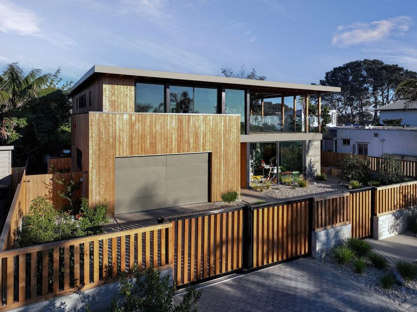 House with wooden fence