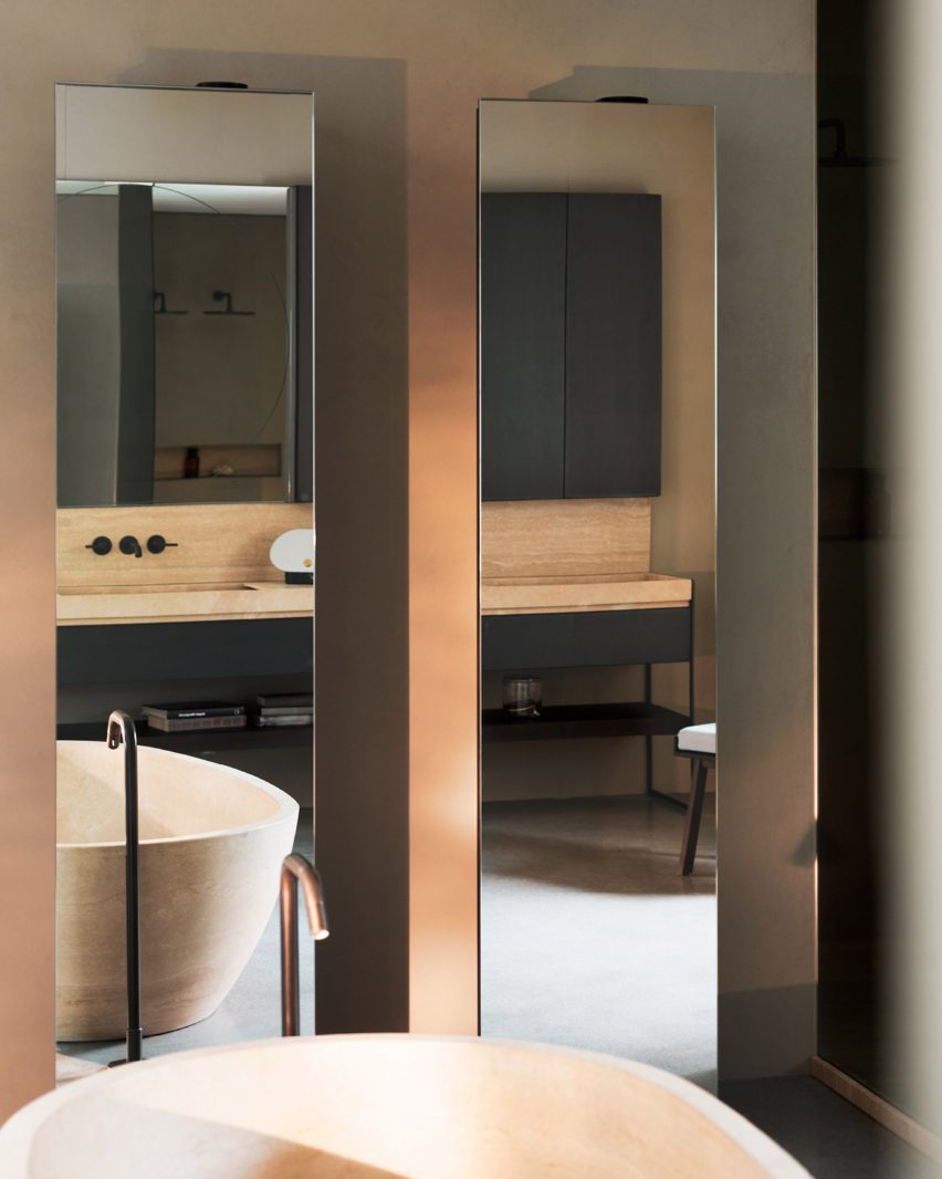 Spoon XL bathtub in travertine from Agape