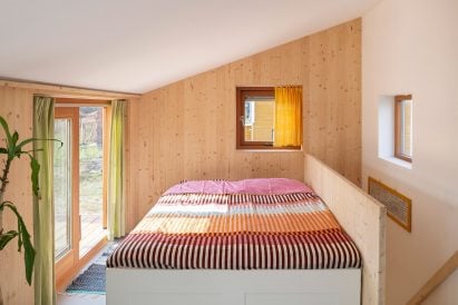 Wood-lined bedroom