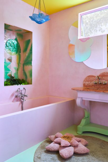 Bathroom with pink bathtub