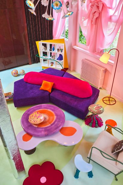 Colourful living room with pink curtains