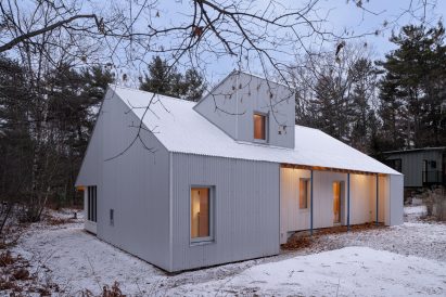 White cabin with snow on it