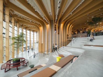 Mass timber interior of World of Volvo by Henning Larsen
