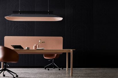 Table underneath suspended acoustic panel