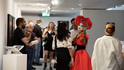 Photo of people in hallway at the Arts University Bournemouth