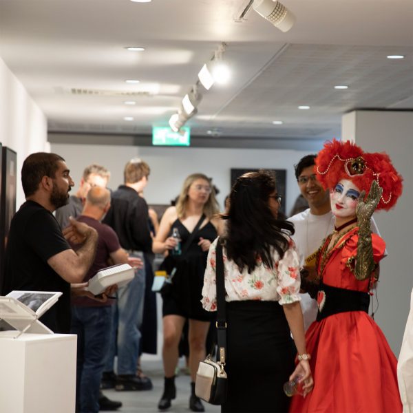 Photo of people in hallway at the Arts University Bournemouth
