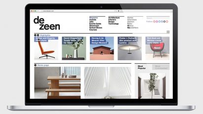 Dezeen website on a laptop