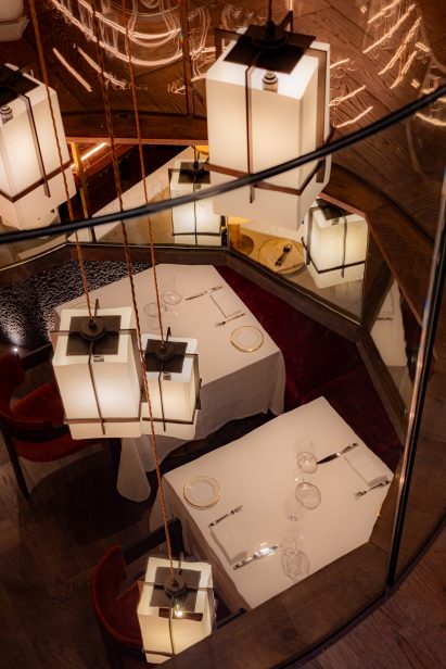 Japanese lanterns hanging into dining area by Rosendale Design