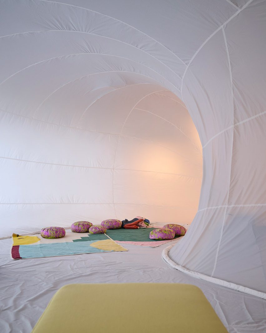 White inflatable with blankets and pillow