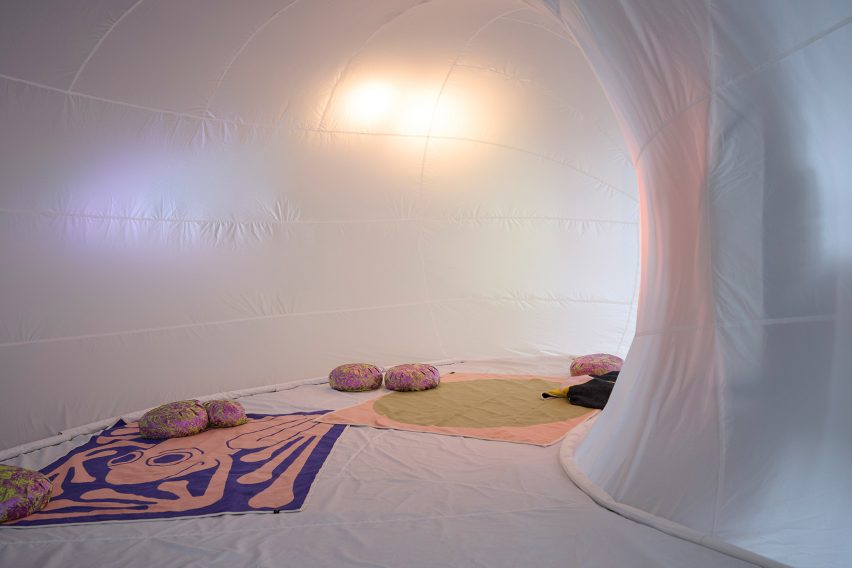 White inflatable with blankets and pillow