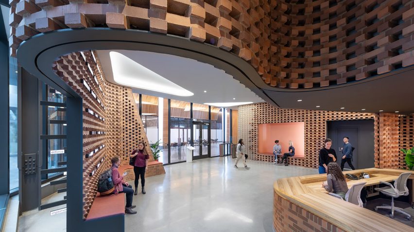Lobby interior with red brick walls