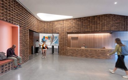 Lobby interior with red brick walls