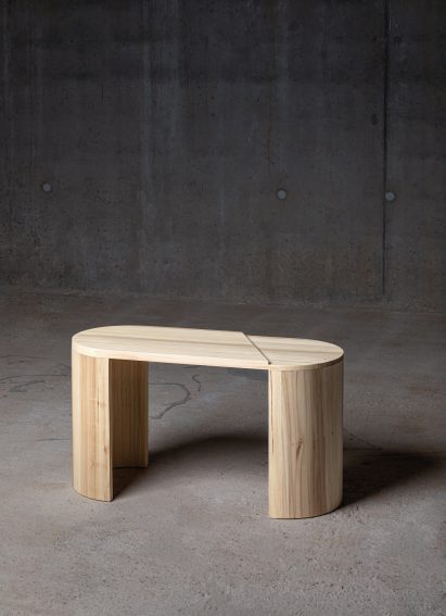 Curved wooden bench by Theodóra Alfreðsdóttir
