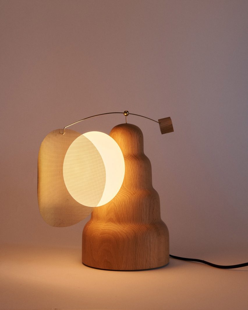 Wooden lamp with moveable shade