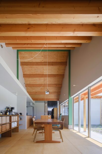 Dining room with sloped wooden ceiling