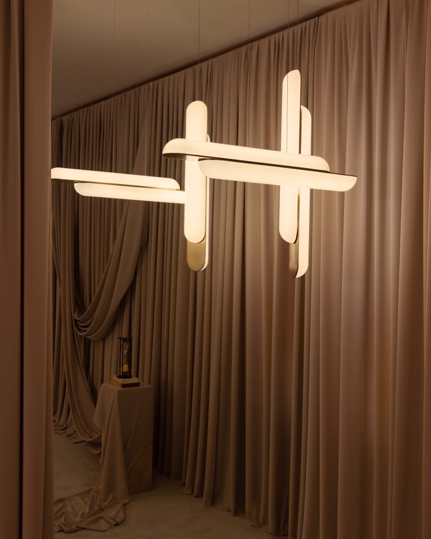 A pendant hanging around curtains