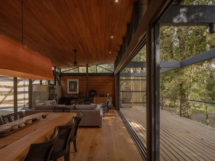 Living room and kitchen next to long deck