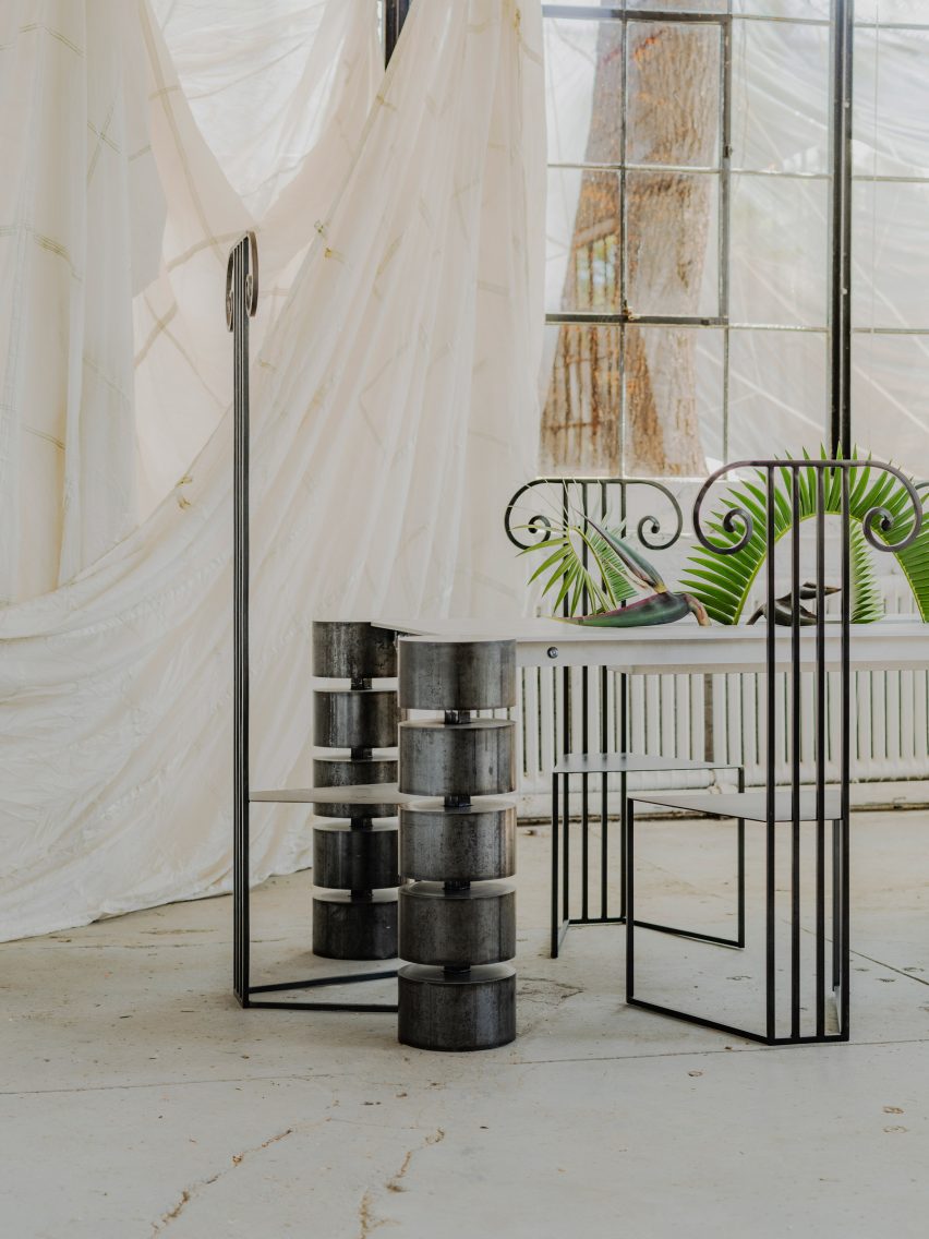 Steel table with column legs