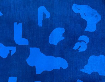 Dark blue fabric with light blue patches