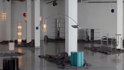 Blue and red furniture pieces at Aram Store from Now 4 Then exhibition