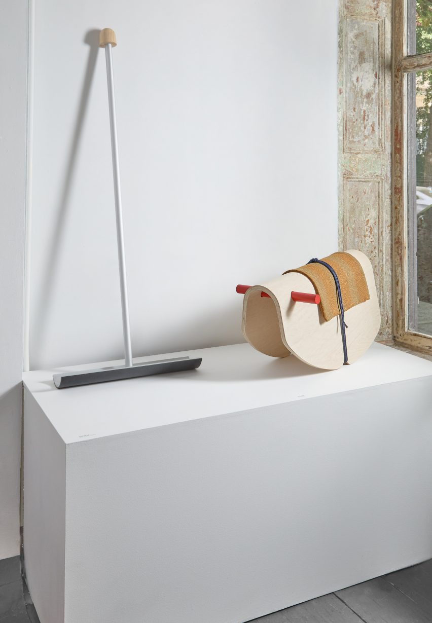 Rocking horse and broom