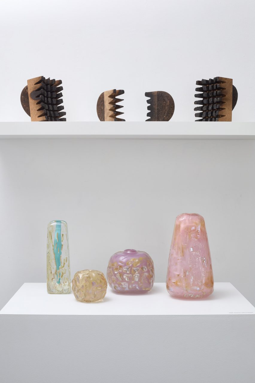 Glass bottles and wooden combs