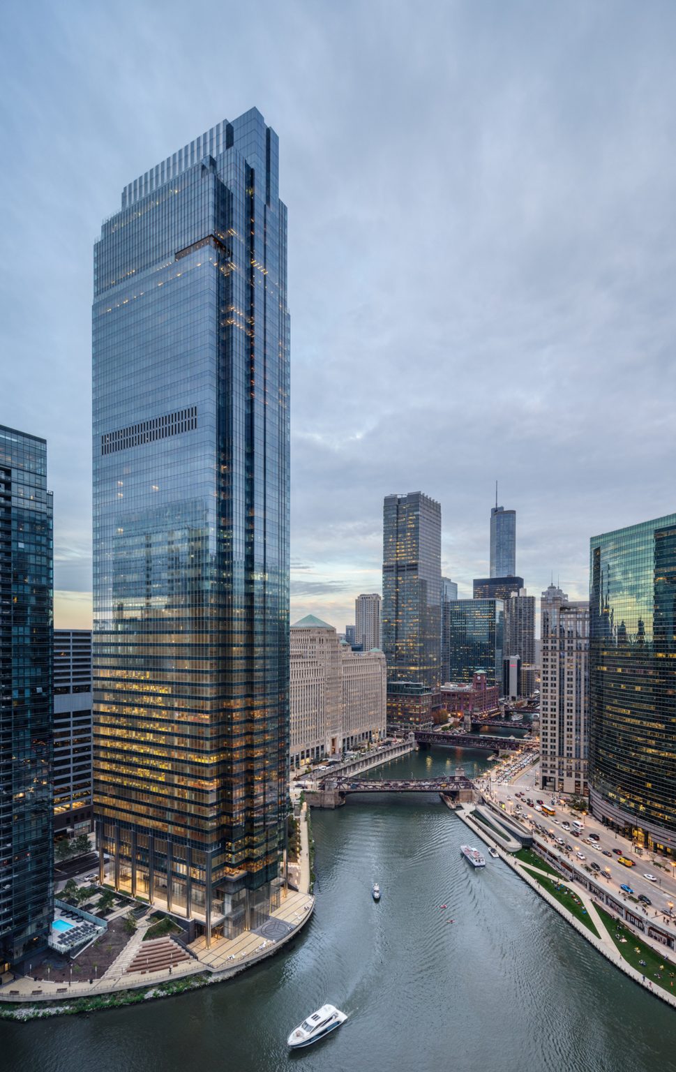 A glass tower along a river in Chicago