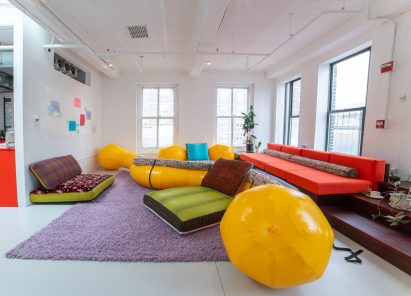 Yellow inflatable with cushions in room