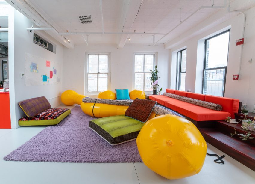Yellow inflatable with cushions in room