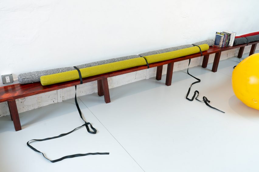 Bench covered in cushions