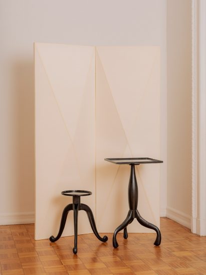 Tables in front of screen