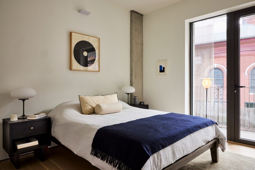 Bed in with sliding glass doors