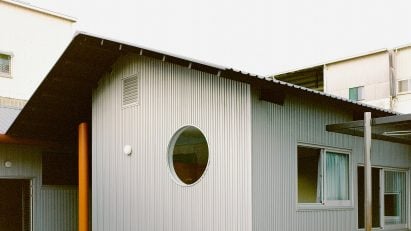 Double Roof House by Studio Tngtetshiu