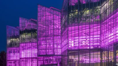 Exterior night view of Vertical Farm Beijing by Van Bergen Kolpa Architecten